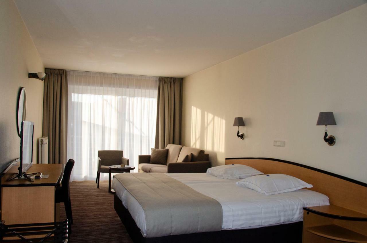 Hotel Arcato Де Хаан Екстериор снимка