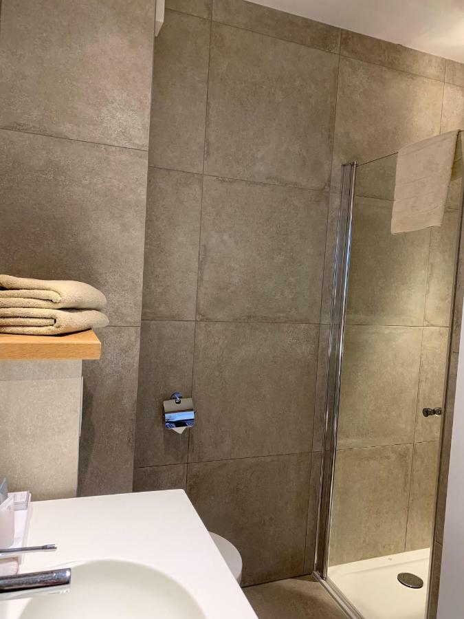 Hotel Arcato Де Хаан Екстериор снимка