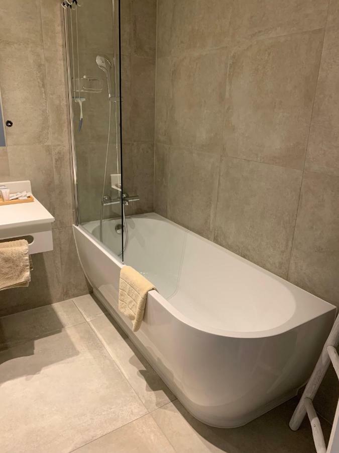 Hotel Arcato Де Хаан Екстериор снимка