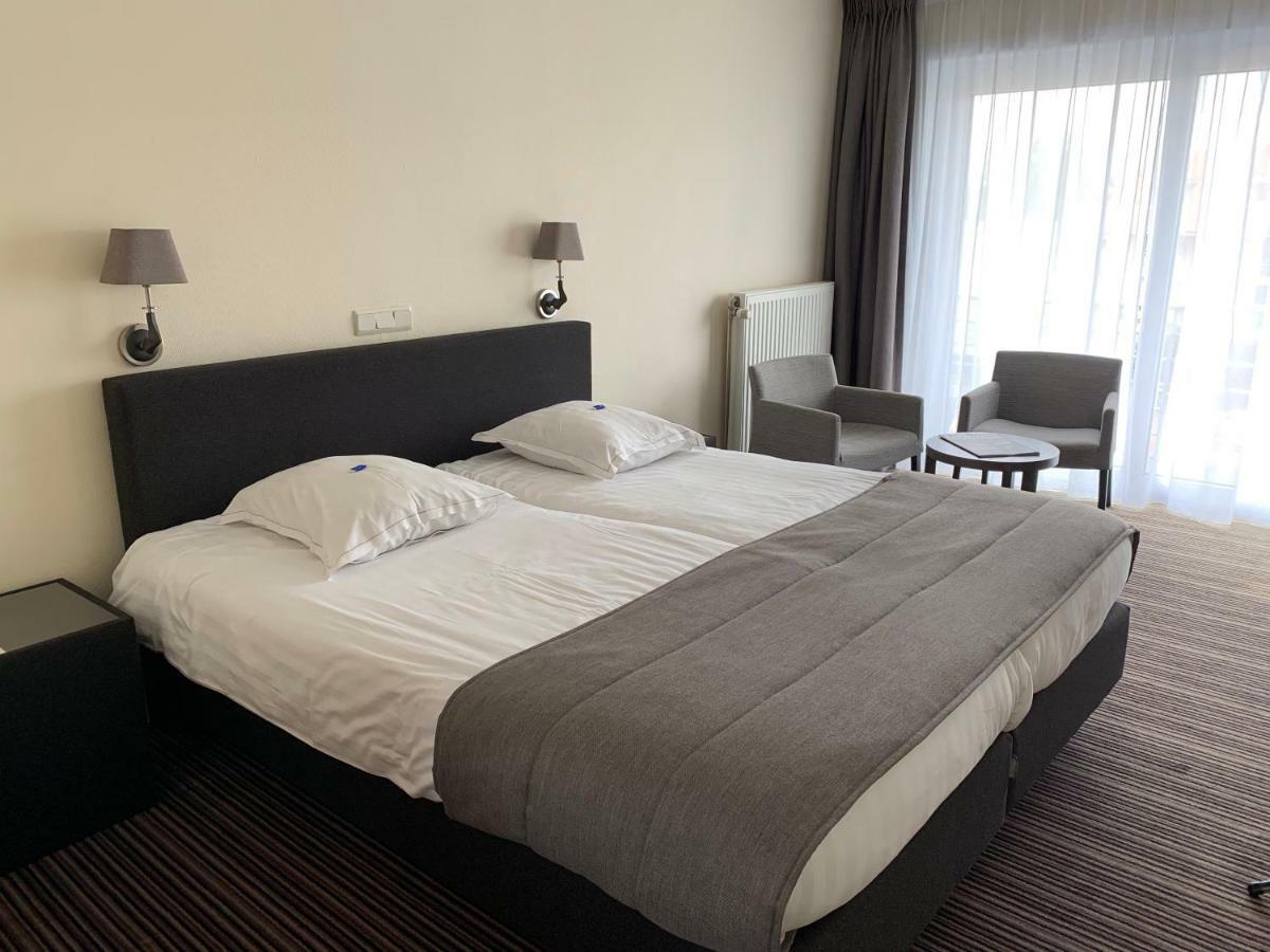 Hotel Arcato Де Хаан Екстериор снимка