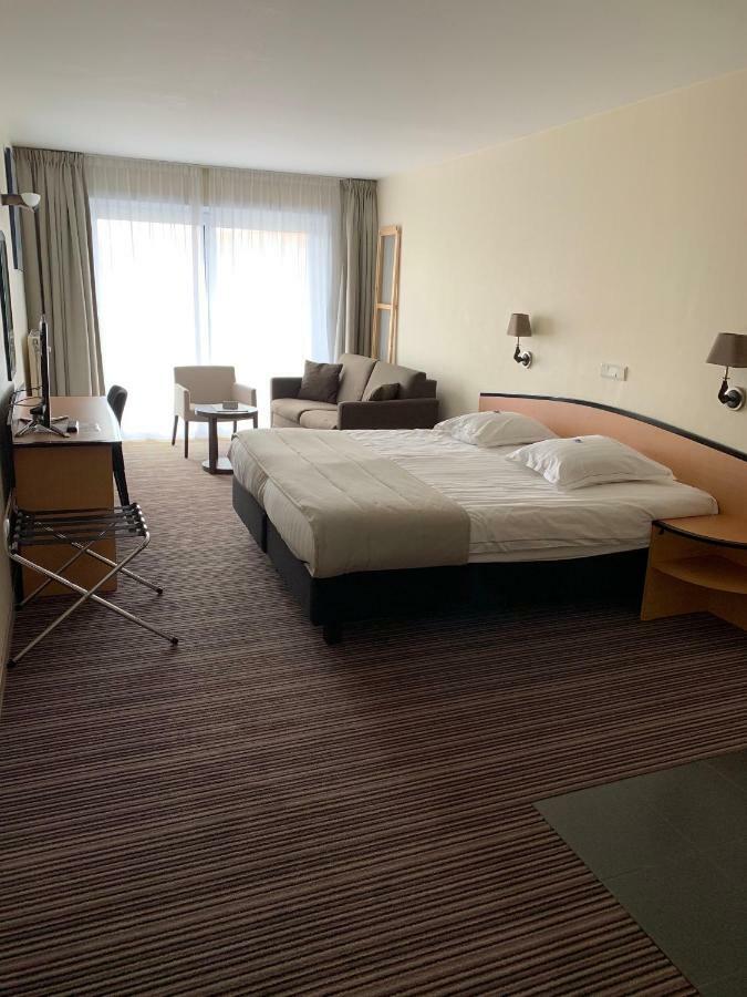 Hotel Arcato Де Хаан Екстериор снимка
